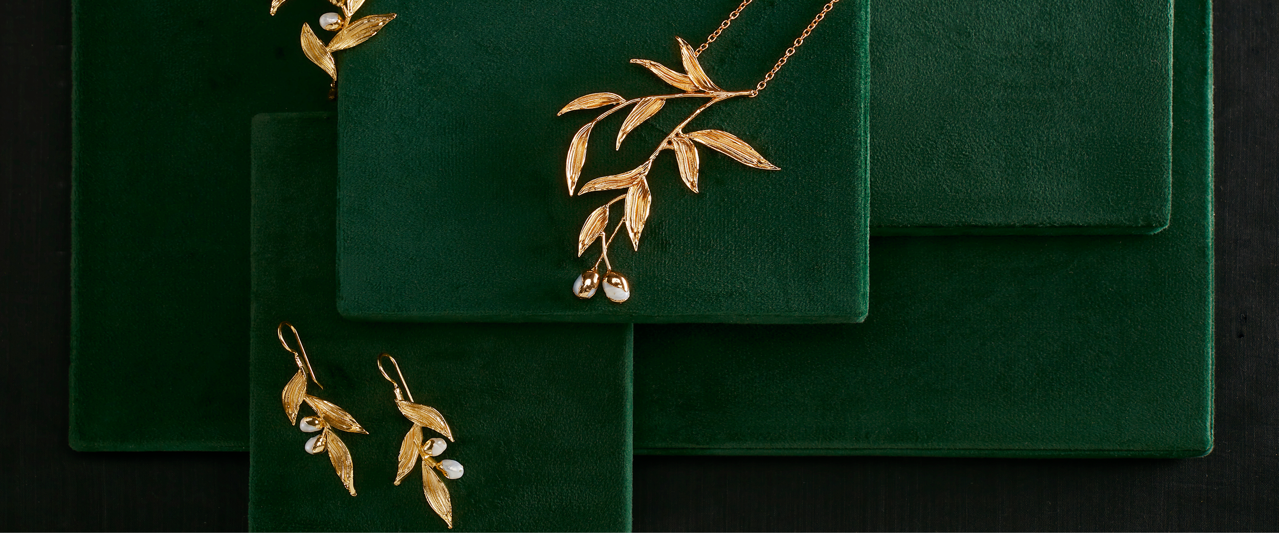 designer earrings and necklaces